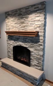 New Fireplace and Stone Surround